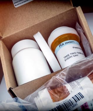 medicine containers in box